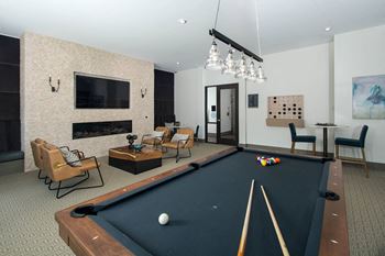 Disconnect to reconnect in the 24hr resident clubhouse lounge and game room with a casual atmosphere and private work pods